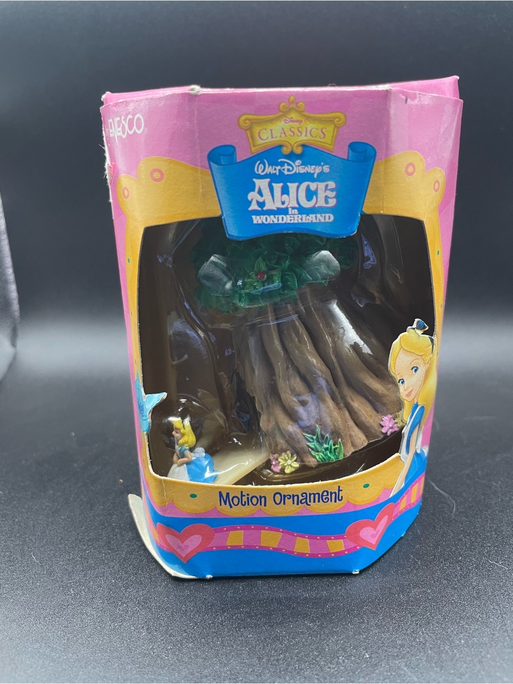 Enesco Disney Alice in Wonderland Pink and Blue Motion Ornament